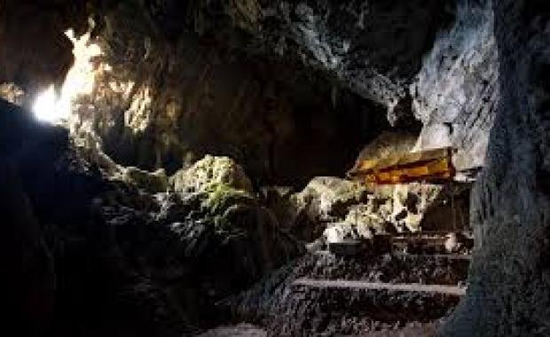 Golden Hollows Beneath Ancestral Peaks | Sacred Caves in Lao Folklore